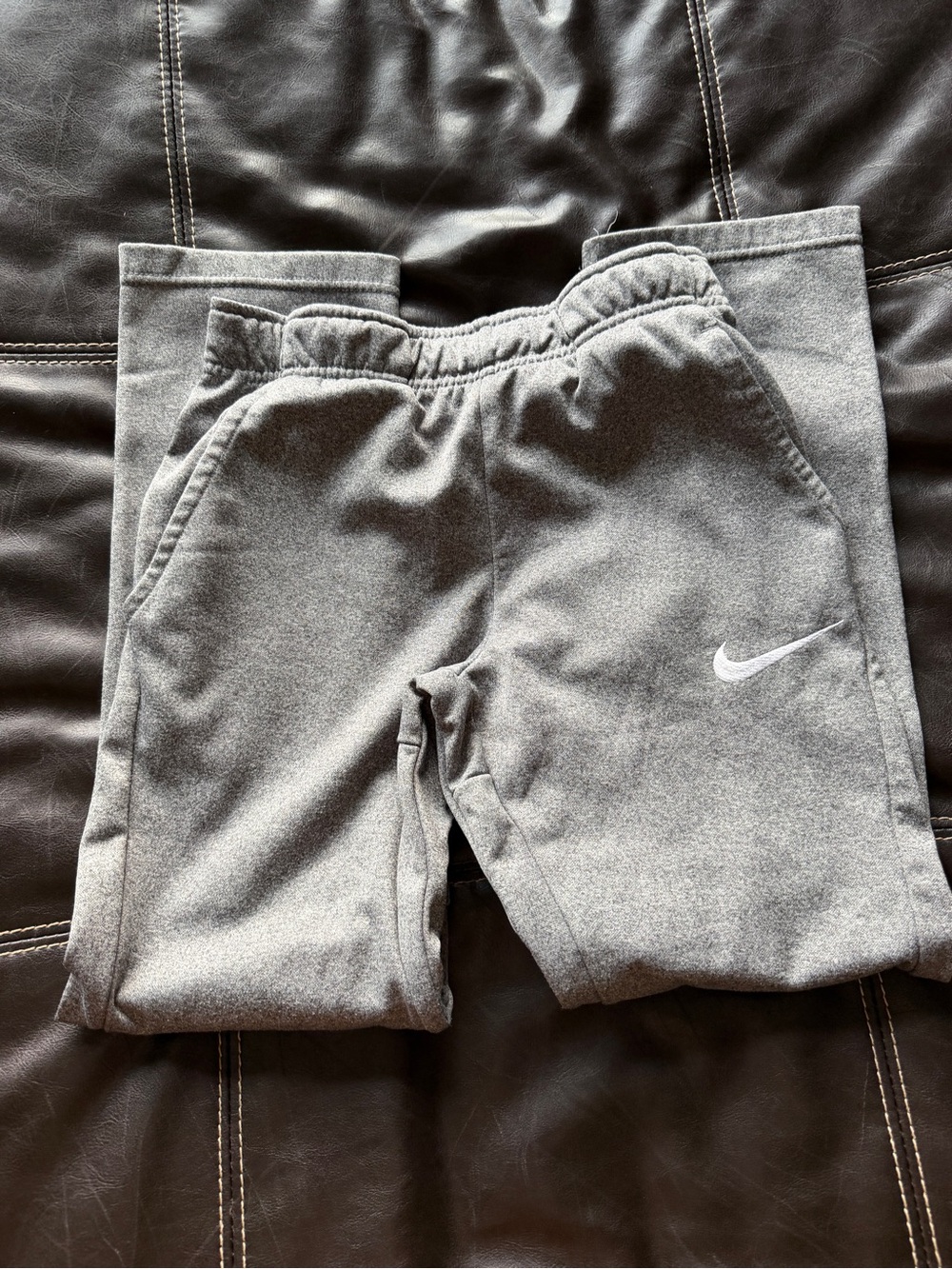 Nike Kids Gray Joggers with White Swoosh